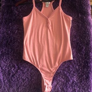 Pink bodysuit with 3 buttons
